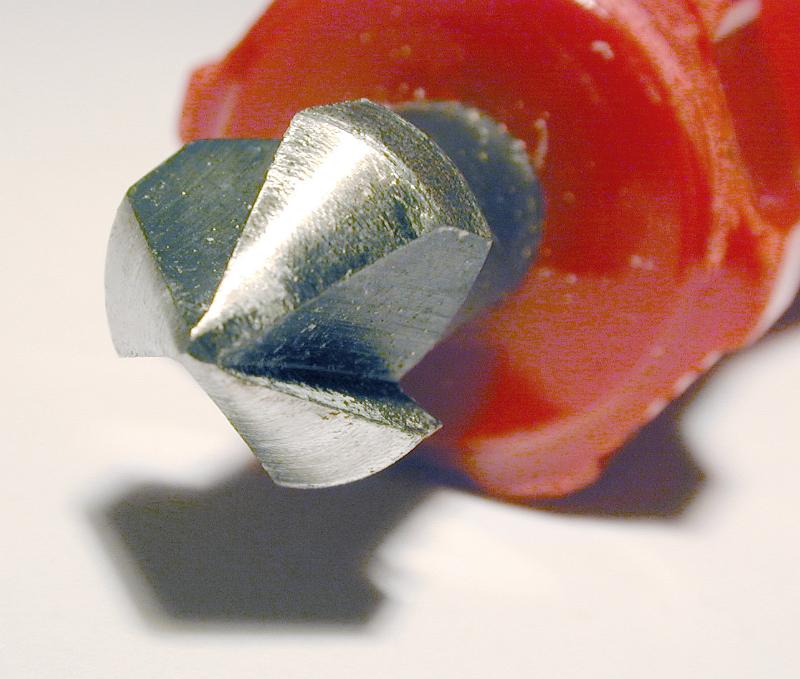 Free Stock Photo: Woodworking hand countersink tool for inserting screws flush with the surface of the wood in a close up on the end of the bit
