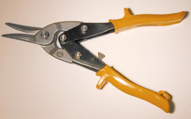 Free Stock Photo: Pair of tin snips with yellow handles on a white studio background with copy space conceptual of DIY, maintenance, and workshop repair