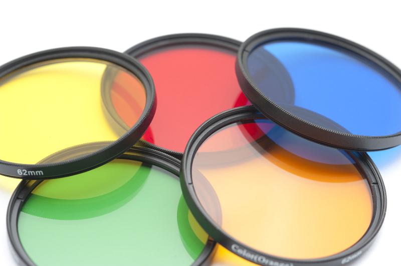 Free Stock Photo: Close up of five round camera lens contrast filters in colors of blue, red, orange, green and yellow
