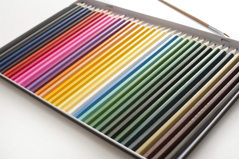 Free Stock Photo: Open box with a large set of new colored pencil crayons for childhood creativity and art viewed at an oblique angle