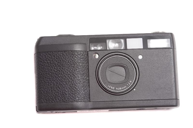 Free Stock Photo: Single isolated compact 35 mm camera with closed automatic lens cover over white background