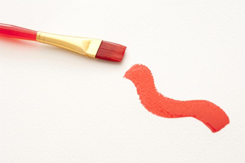 Free Stock Photo: Little wave as red paint stroke with medium tip paint brush next to it on texture white paper