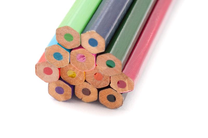 Free Stock Photo: A closeup of the blunt end of coloured pencils on a white background