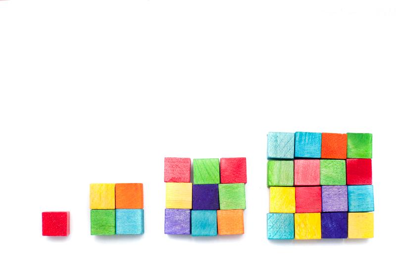 Free Stock Photo: Block of pastel cubes formed into square numbers 1, 4, 9, 16