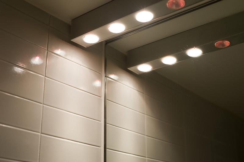 Free Stock Photo: a row of halogen lights over a bathroom mirror