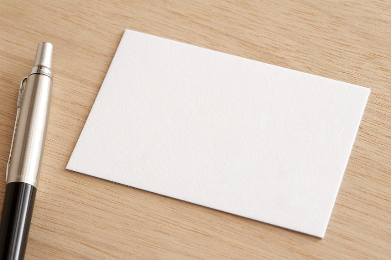 Download image of Pen and Blank Card on Wooden Table Free Stock Photo: Close up Pen and White Card with Copy Space on Top of a Wooden Table