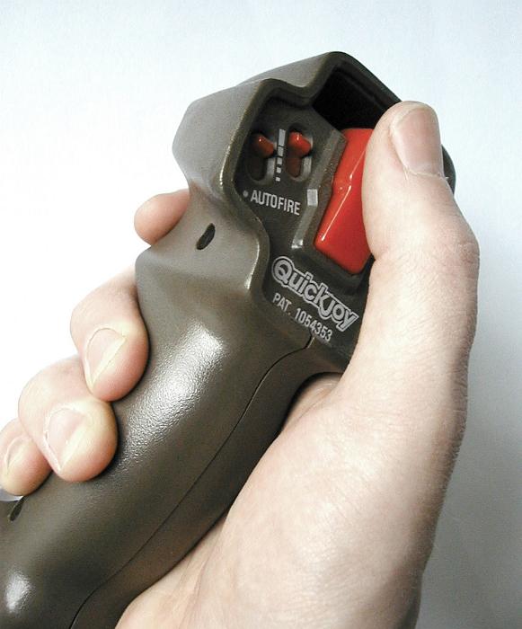 Download image of Hand Holding Joystick Device Against White Free Stock Photo: Close up Human Hand Holding Black Joystick Device Against White Background.