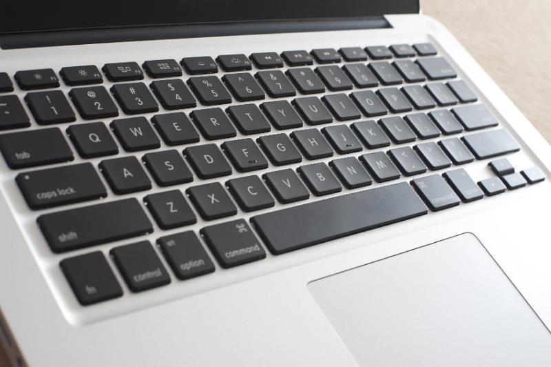 Free Stock Photo: Close up view of open laptop computer featuring black keyboard and silver body