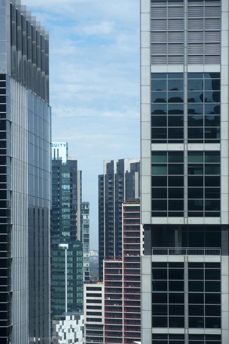 Free Stock Photo: Valley of various tall office buildings in large city with copy space in rectangular windows