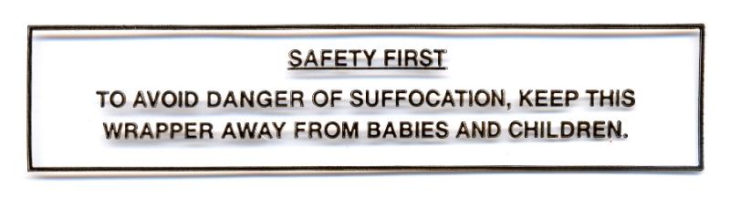 Free Stock Photo: Safety first wrapper label warning that the plastic wrapper must be kept out of the reach of babies and children