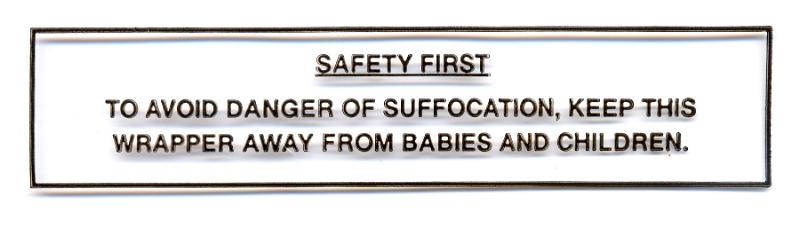Free Stock Photo: Safety first wrapper label warning that the plastic wrapper must be kept out of the reach of babies and children