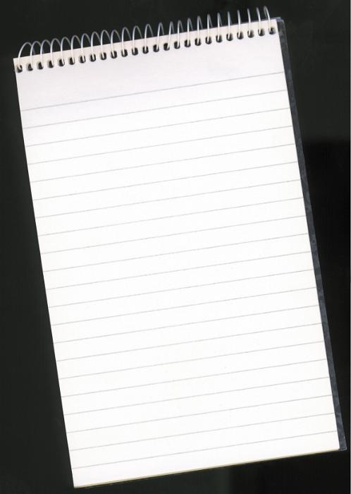 Free Stock Photo: Top down view on blank unused spiral notepad with lines over black background for concept about business, education or journalism