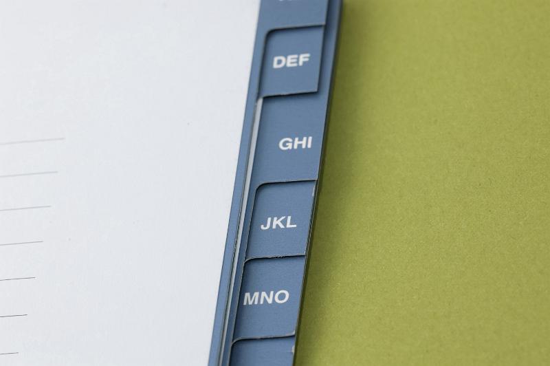 Free Stock Photo: Alphabetical index tabs on an address book with grouped lettering to organise and locate your information