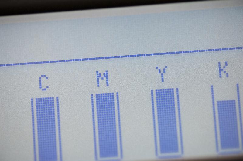 Free Stock Photo: Digital display of toner levels for CMYK on a photocopier or printer