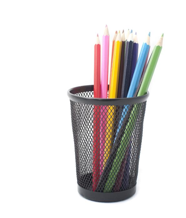 Free Stock Photo: Colored pencils in black pen holder on white background