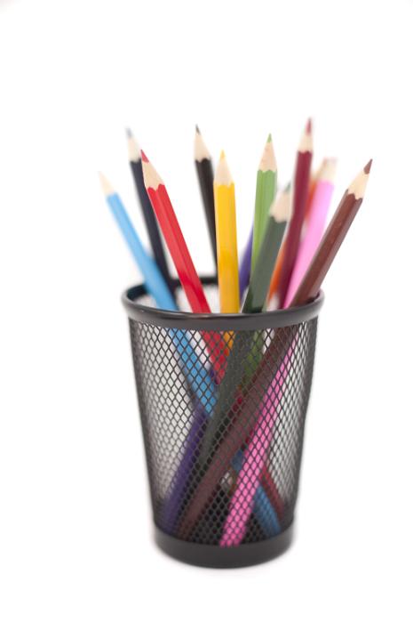 Free Stock Photo: Colored pencils in black pencil holder isolated on white