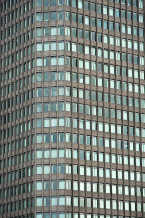 Free Stock Photo: Exterior facade of a modern commercial office block with multiple windows
