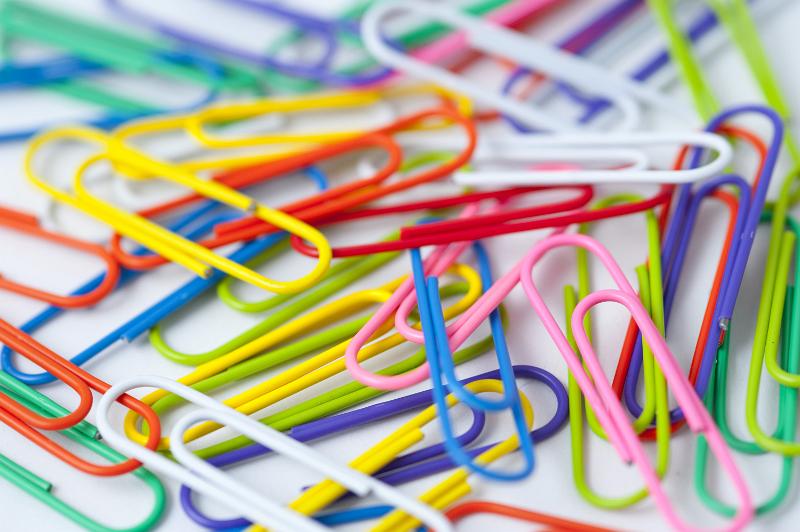 Free Stock Photo: Pile of colorful paperclips background- shallow DOF