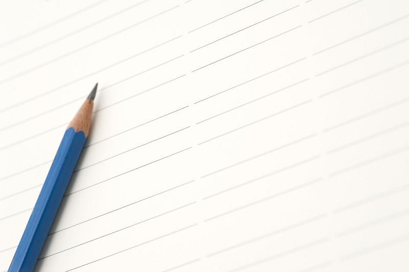 Free Stock Photo: Sharp blue pencil on lined paper with space to place your message or text between the lines