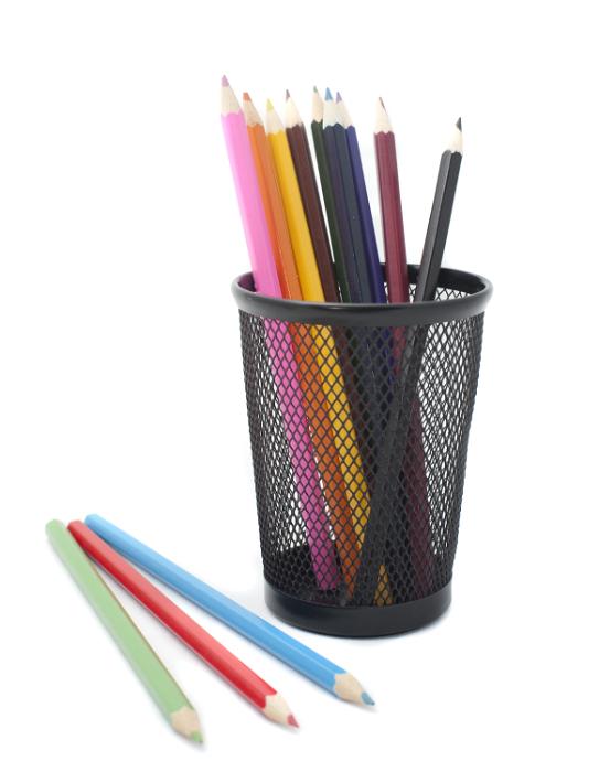 Free Stock Photo: Multicoloured sharpened wooden pencils in a container with a red, blue and green pencil crayon in the foreground