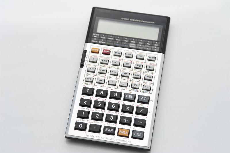 Free Stock Photo: Overhead view of the keypad of a scientific calculator isolated on a studio background