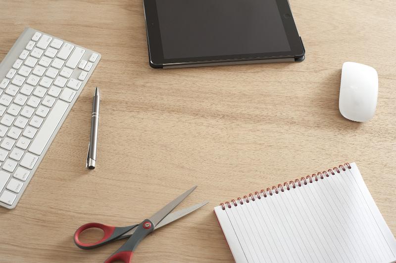 Free Stock Photo: a wooden work surface with various office articles and plenty space of text in the centre and on the tablet computer screen or notepad