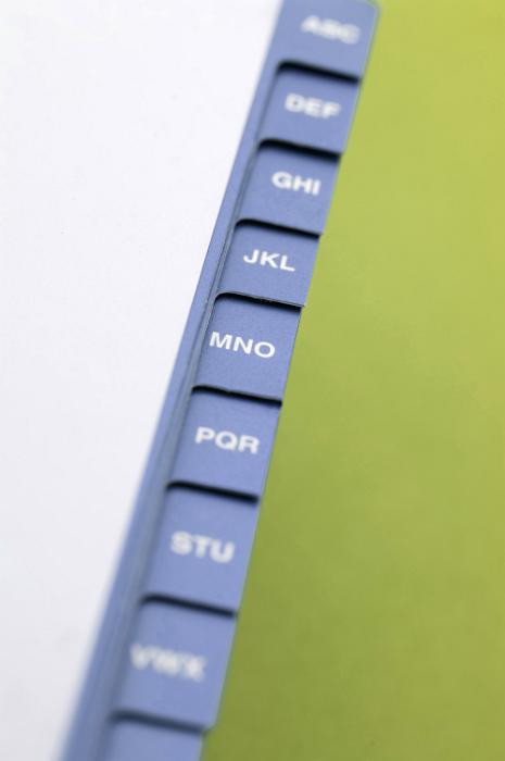 Free Stock Photo: Alphabetic indexed address book with the cover open to reveal the letter tabs