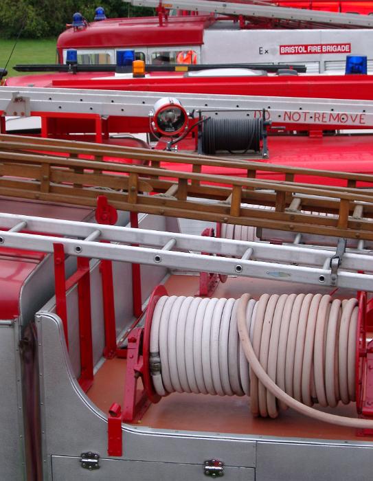 Free Stock Photo: fire hose reels on top of a fire engine