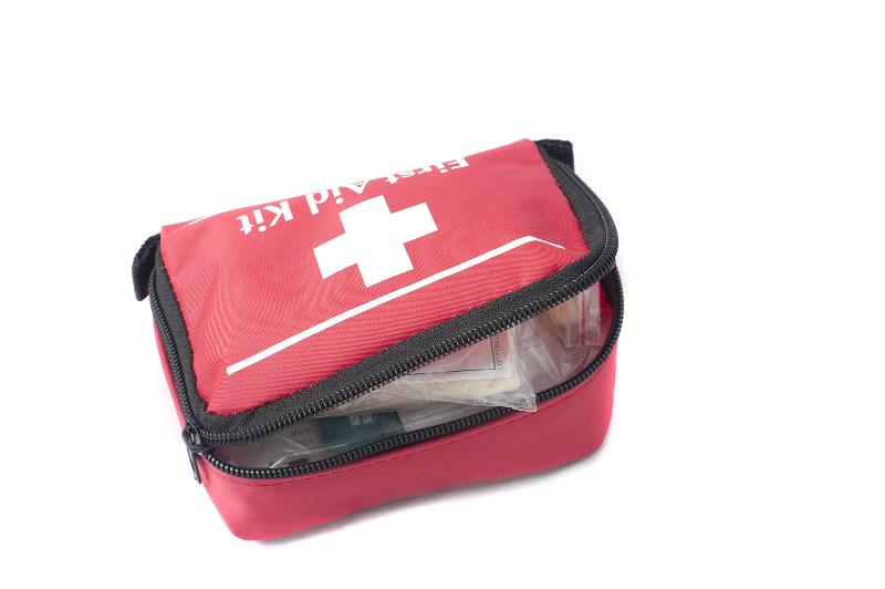 Free Stock Photo: Portable first aid kit in a zipped container suitable for use in emergencies on a white studio background