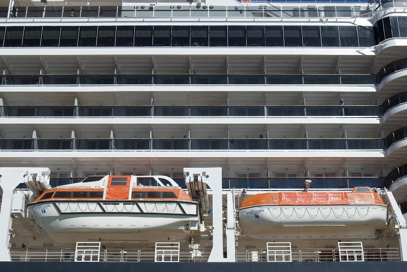 Free Stock Photo: Lifeboats suspended from davits along the side of a large passenger liner for use if the ship is abandoned during sinking