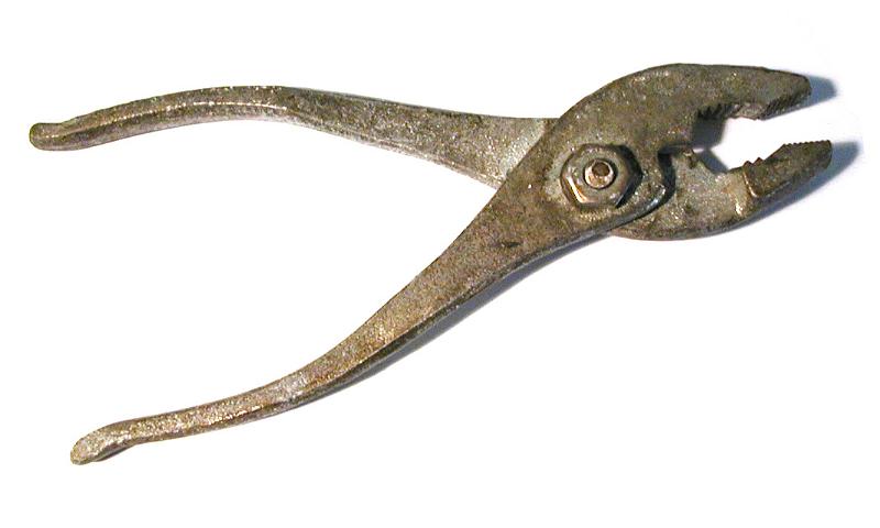 Free Stock Photo: Isolated Cut Out of Old Rusty Metal Pliers Angled on White Background