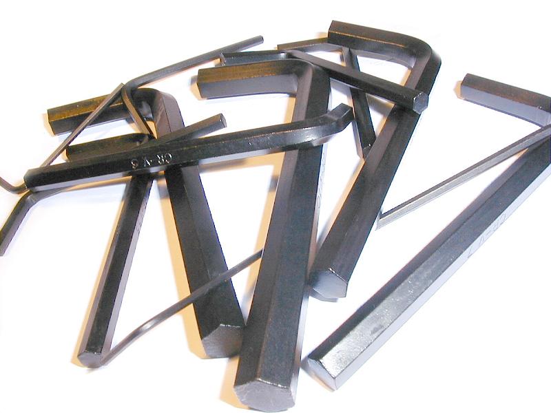 Free Stock Photo: Set of hexagonal allen keys in a range of sizes lying scattered randomly on a white surface