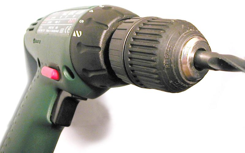Free Stock Photo: Close Up Detail of Electric Drill with Bit on White Background