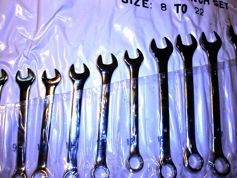 Free Stock Photo: Collection of Combination Spanner Wrenches Arranged by Size in Plastic Packaging